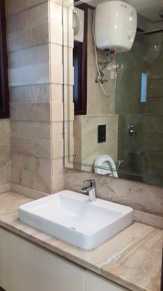 Second bathroom with different marble stone, chrome wall-mount faucet and integrated mirror cabinet — Bathroom 2, Green Park Residence
